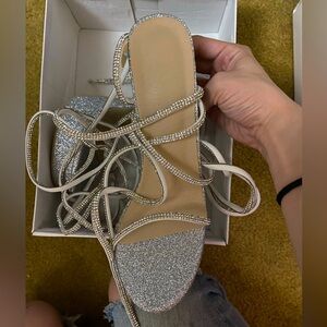 Laced up high heels glittery